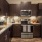 a kitchen with wooden cabinets
