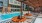 a pool with a deck and chairs