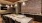 a room with a couch and tables