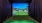 a screen with a green field and a blue curtain